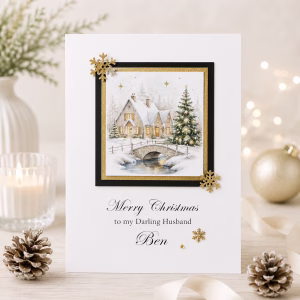 Personalised luxury Christmas card featuring an elegant snowy winter cottage scene with Christmas tree, gold details and custom name and relationship wording.