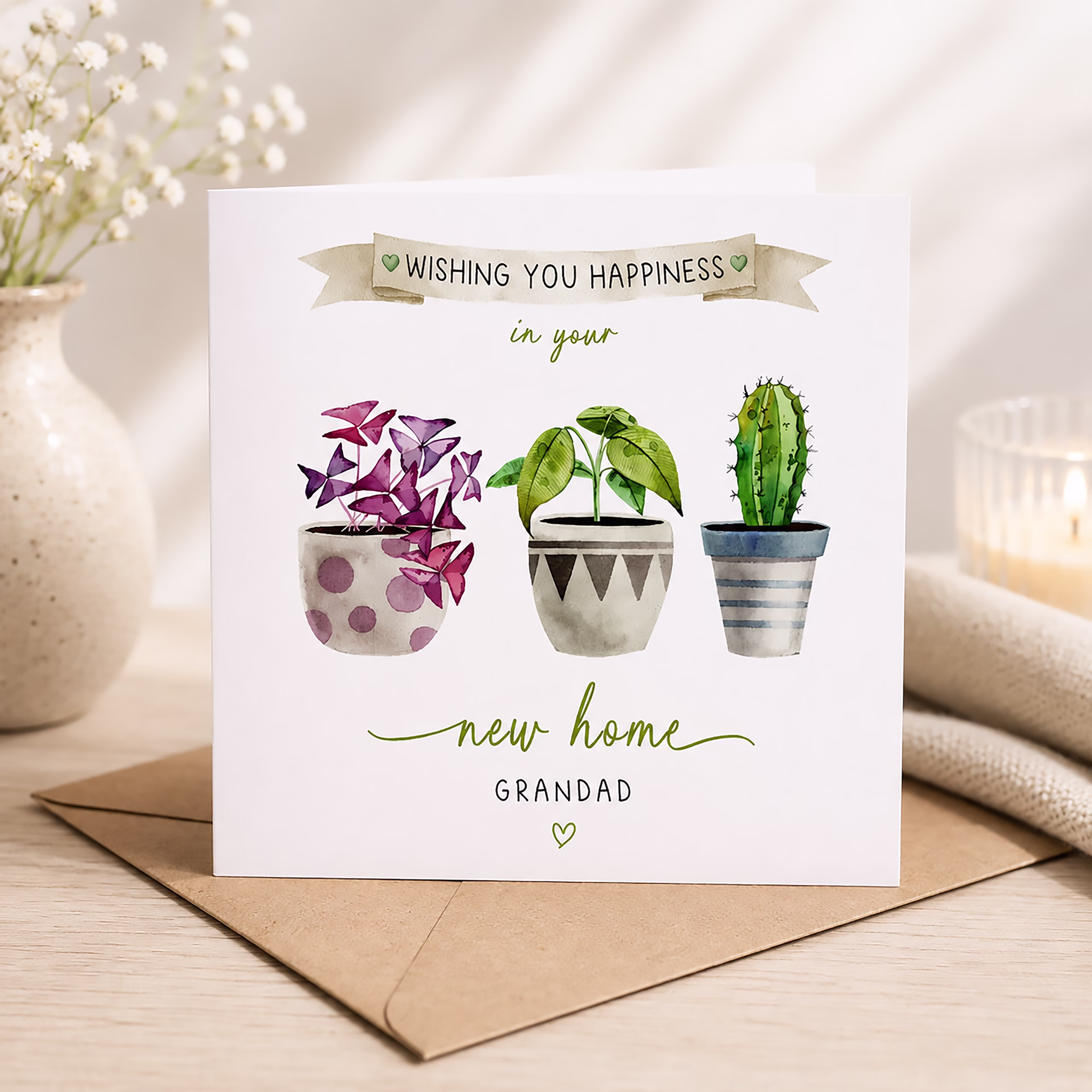 Personalised new home card for Grandad featuring three colourful illustrated houseplants.