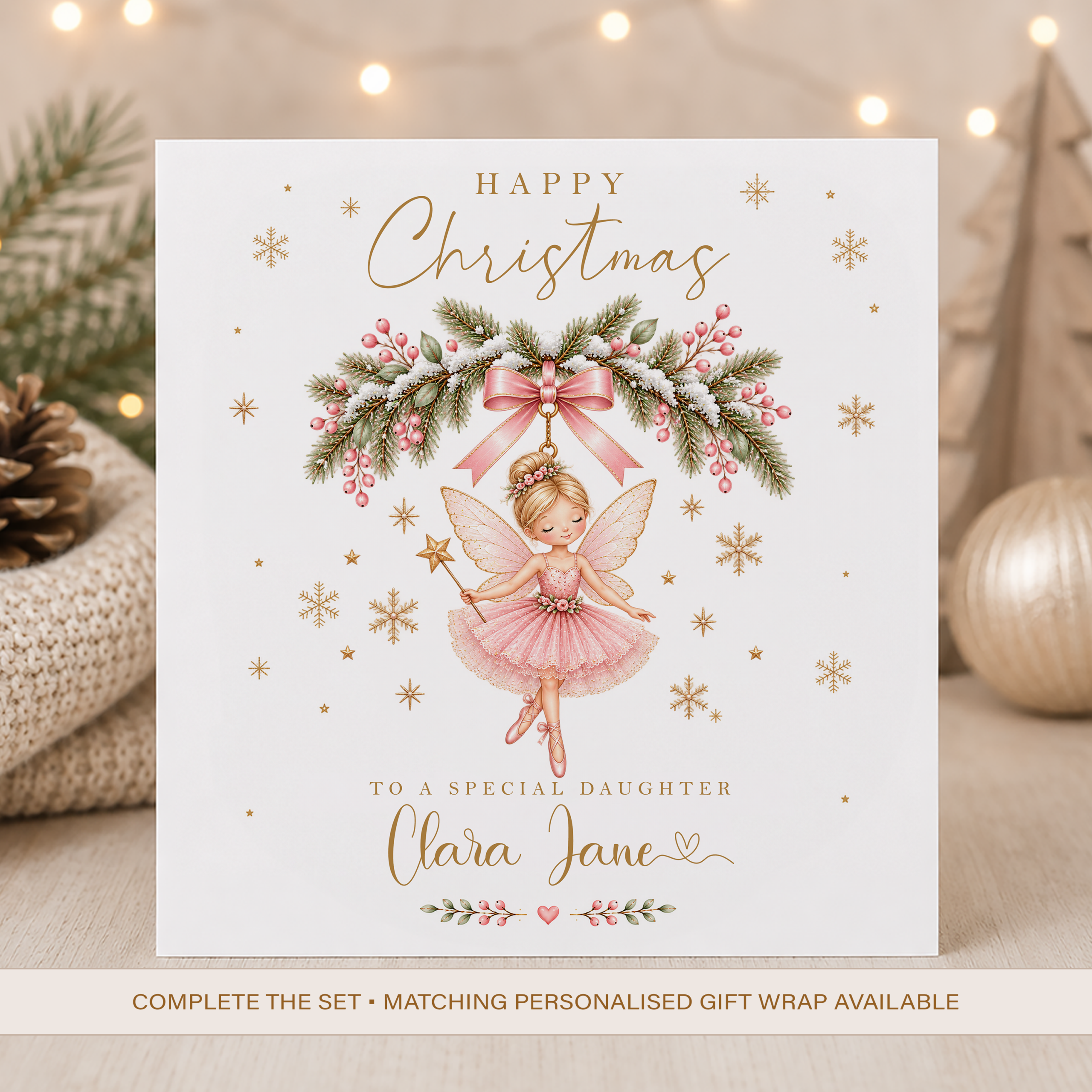 Personalised daughter Christmas card with pink Christmas fairy, festive greenery and name