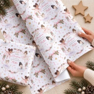 Ballerina Christmas wrapping paper displayed on a wrapped present with matching personalised Christmas card and sack available separately.