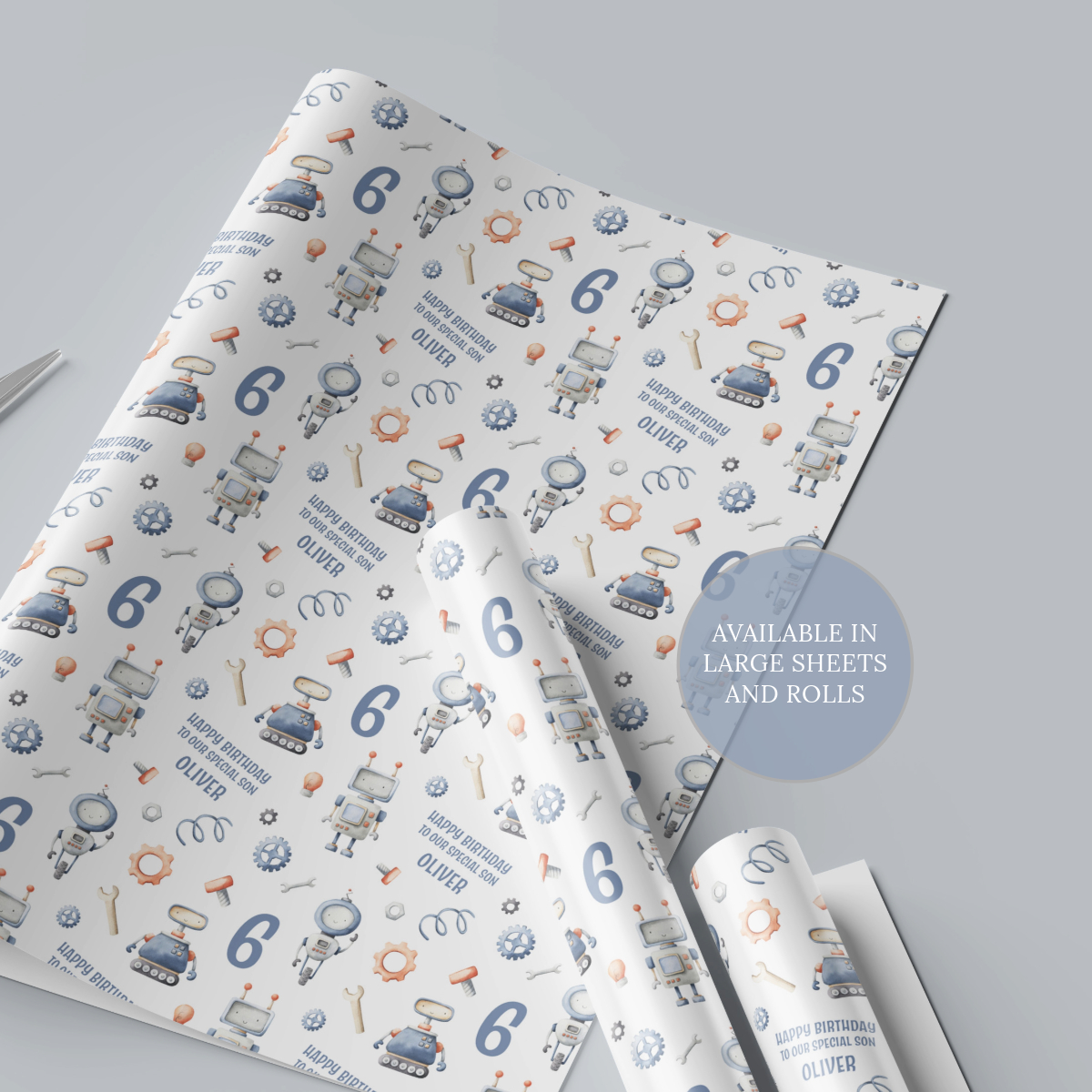 Personalised children's robot gift wrap one sheet and two rolls with bolts screws and a wrench characters on a blue background