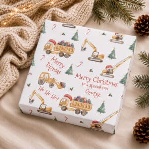 Personalised construction Christmas gift wrap with wrapped present and festive digger design