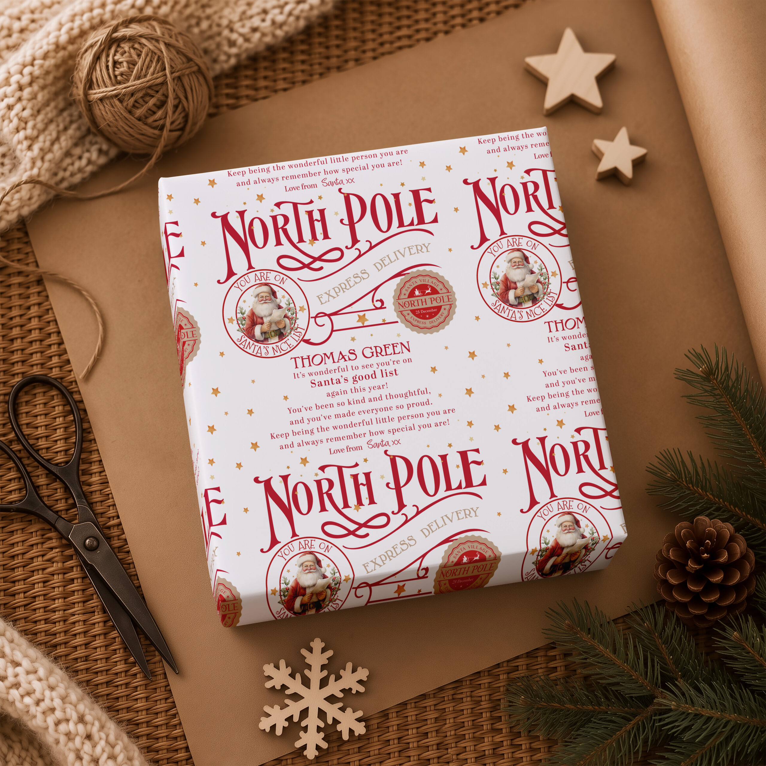 Christmas presents wrapped in personalised Santa wrapping paper with child’s name