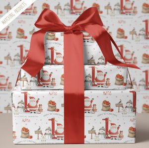 Personalised Baby's 1st Christmas Wrapping Paper, with santa and a snow man in front of a large red number one.