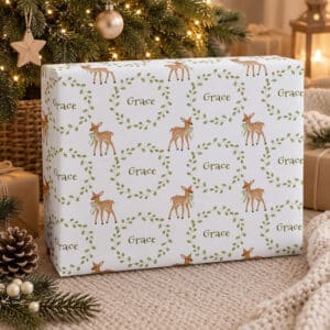 Personalised children's Christmas wrapping paper with watercolour deer and name