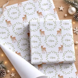 Personalised Christmas gift wrap with deer, green wreath and child's name