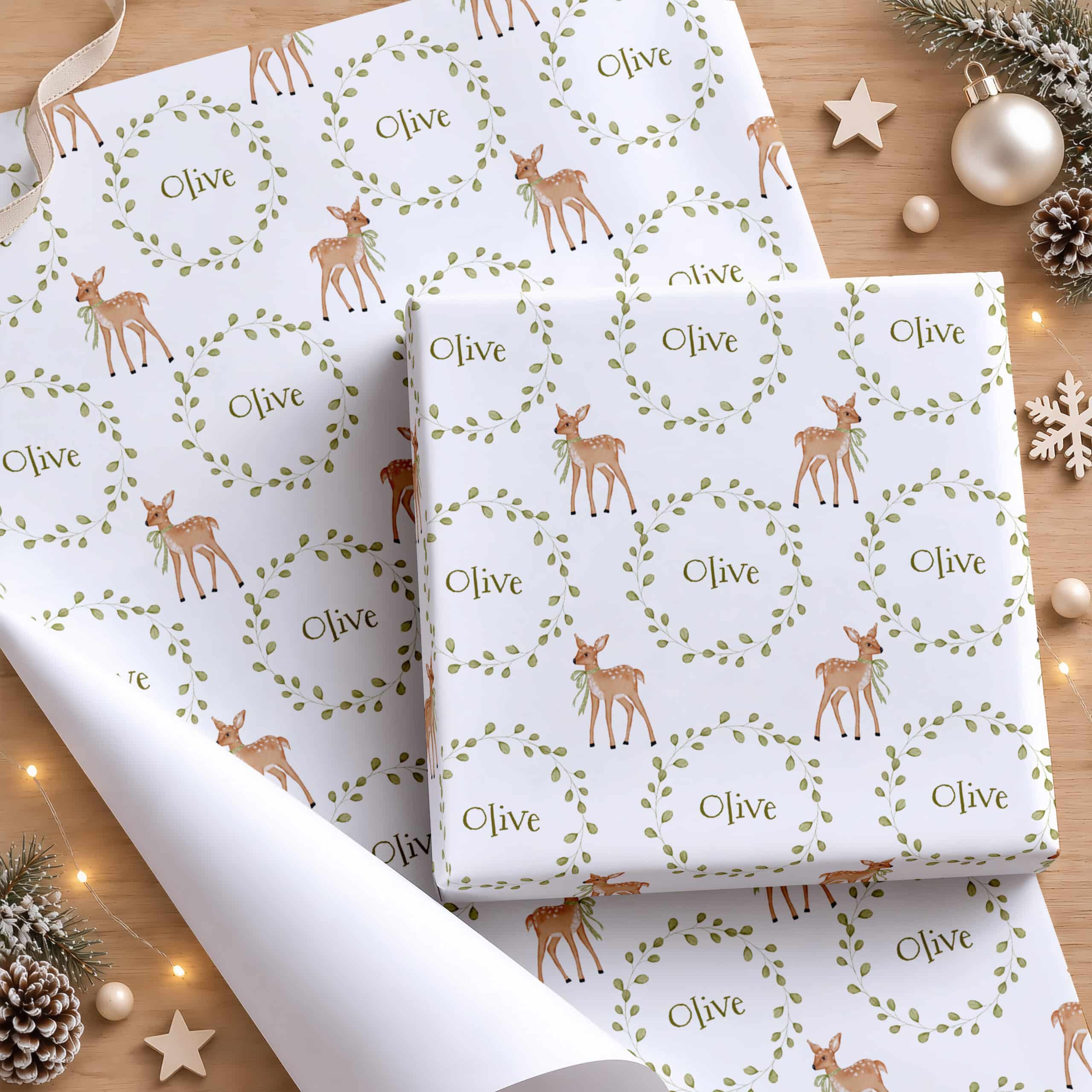 Personalised Christmas gift wrap with deer, green wreath and child's name