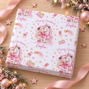 Pink and white unicorn Christmas gift wrap featuring a little girl in a pink Santa outfit, candy canes, golden snowflakes and personalised wording.