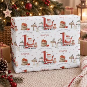 son’s first Christmas personalised gift wrap with name, Santa and festive characters