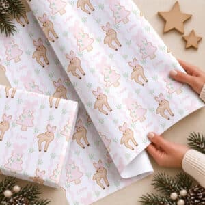 Girls personalised Christmas wrap with reindeer, pink trees, bows and name