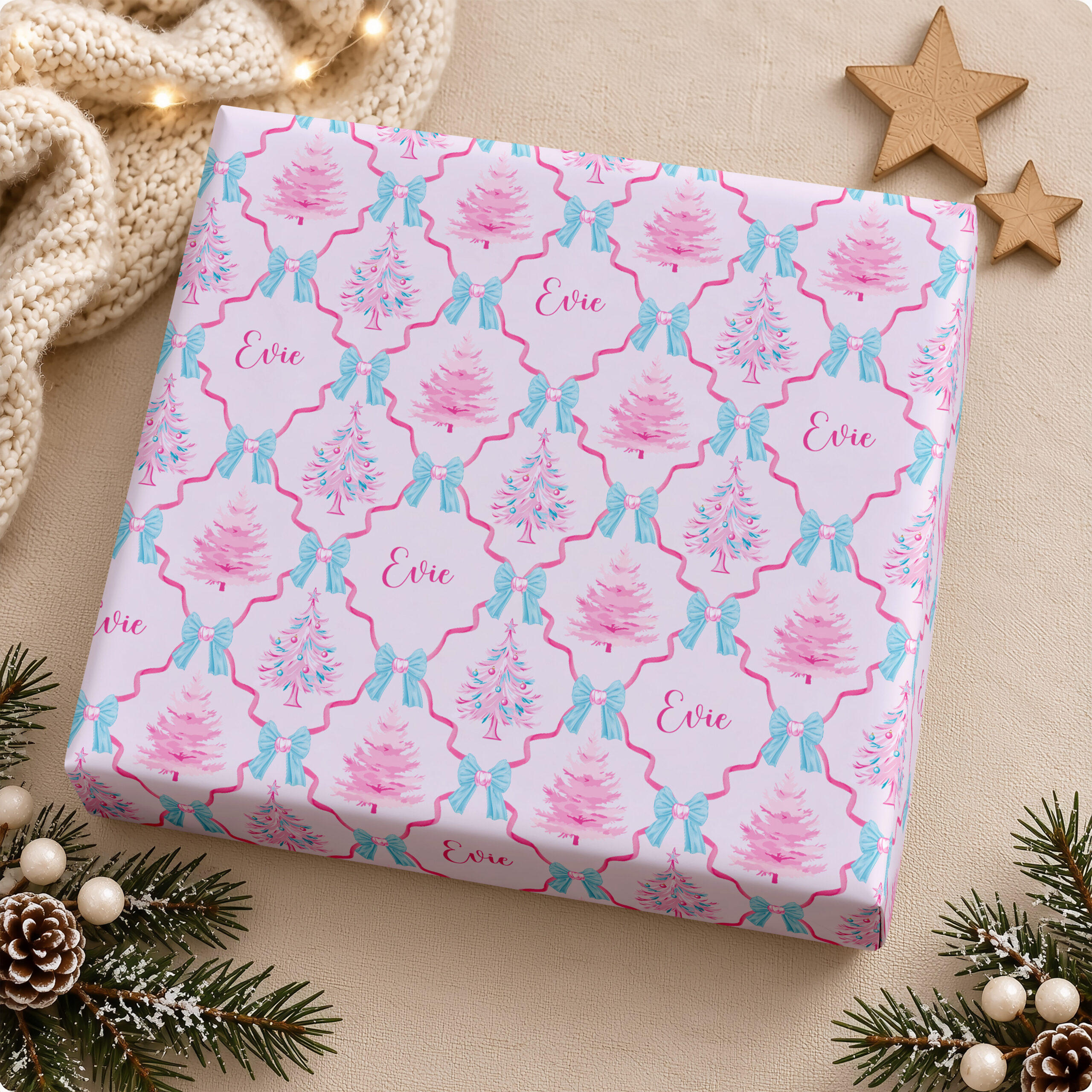 Pink Christmas wrapping paper personalised with a child’s name