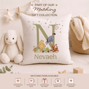 Personalised nursery linen winnie the pooh cushion with matching personalised nursery gift collection including cards, mugs, gift wrap, money pots and wall pennant.