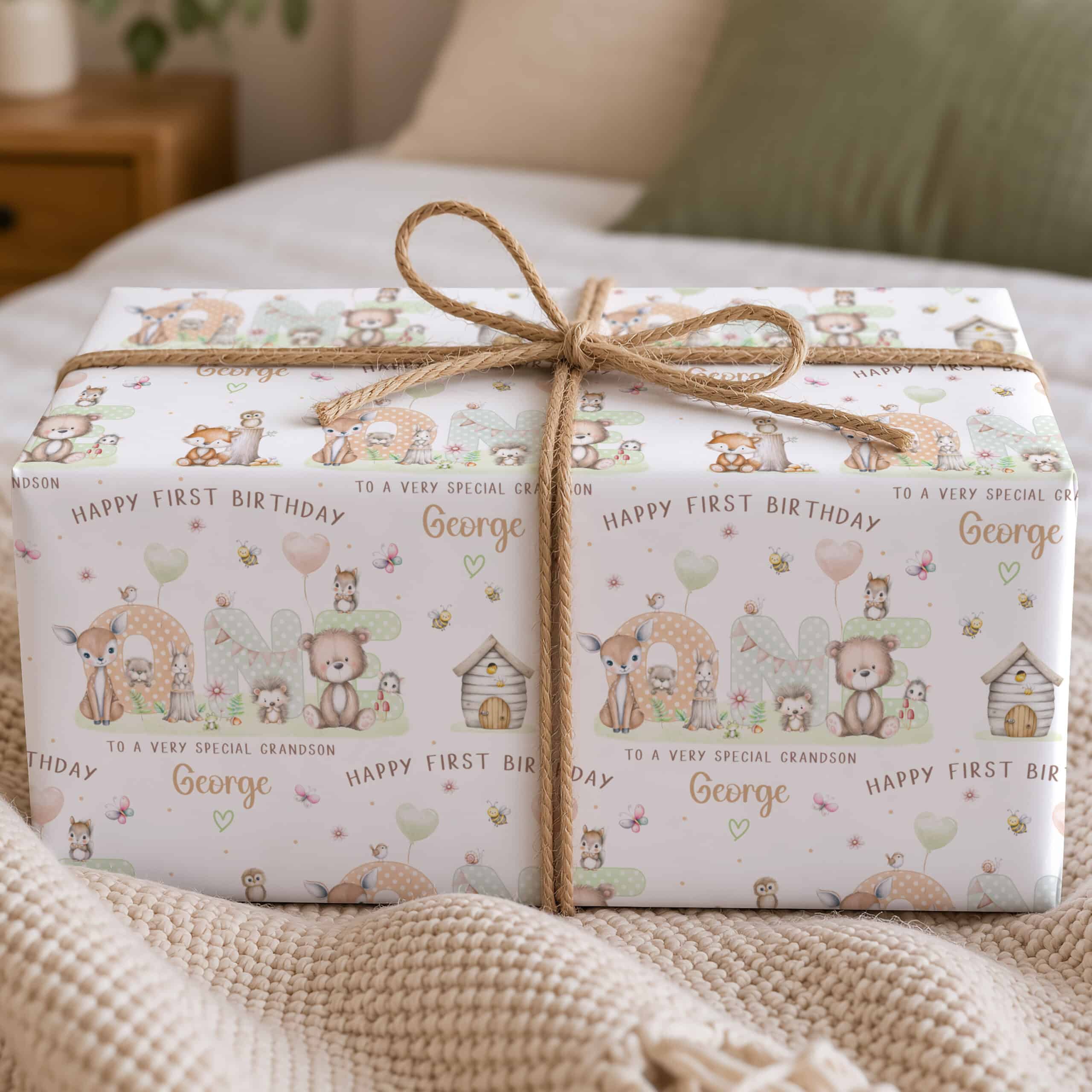 Personalised grandson first birthday wrapping paper with woodland animal design and name