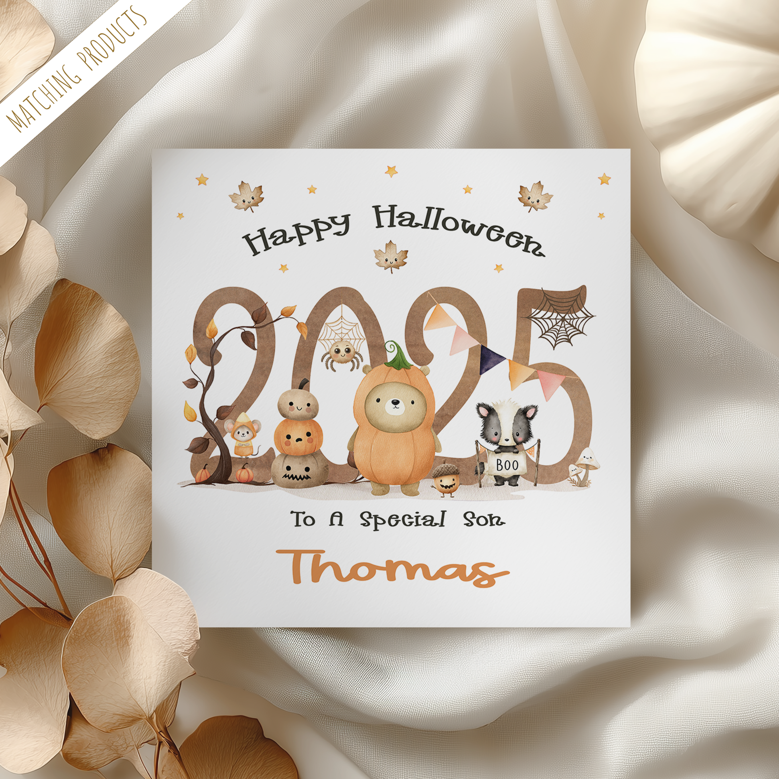personalised kids halloween card, featuring a 2025 design in large numbers with cute halloween animals.