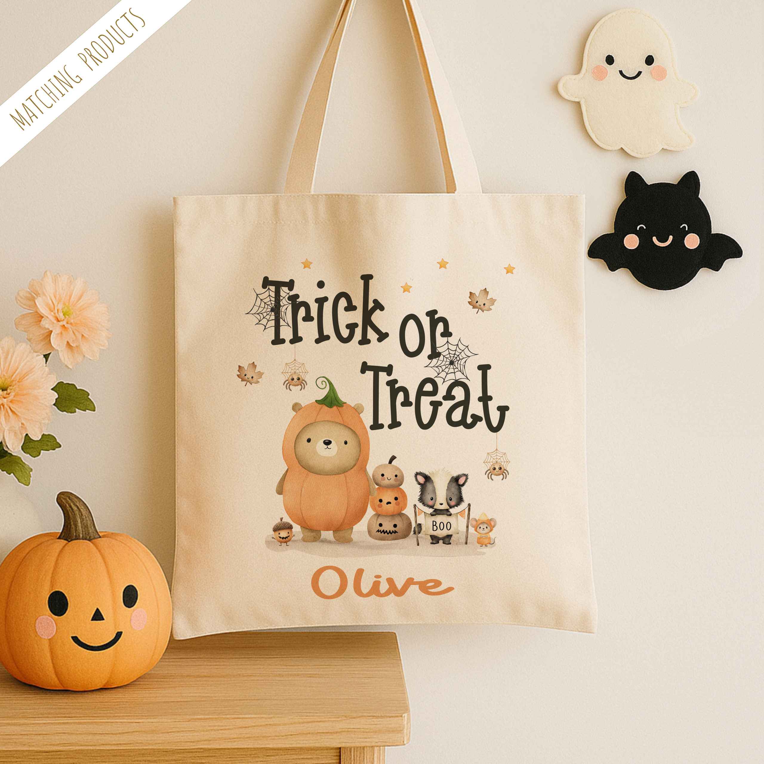 Personalised trick or treat tote bag, with a cute bear design with the childs name added to the bottom in orange print