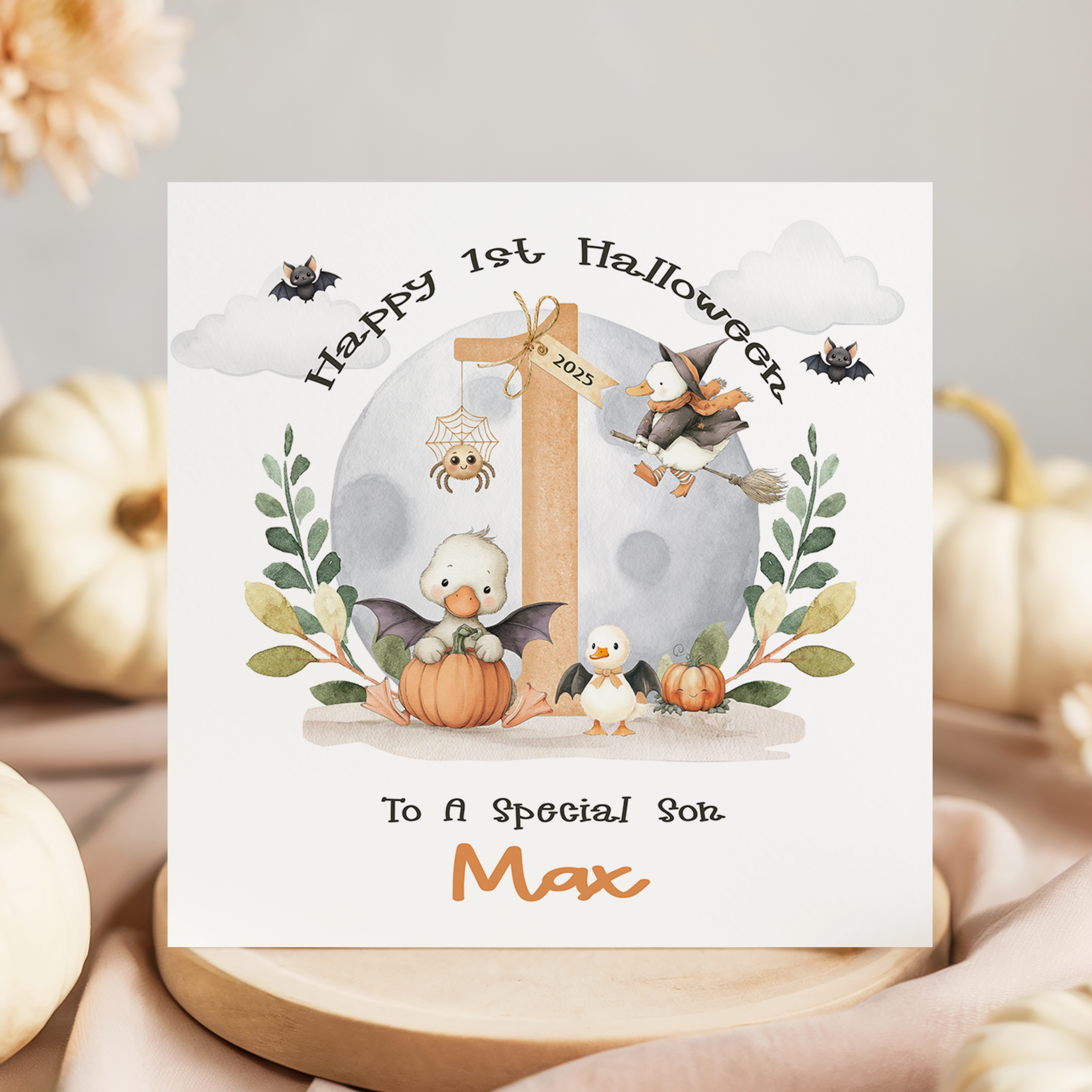 baby's personalised 1st halloween card with cute duck theme.