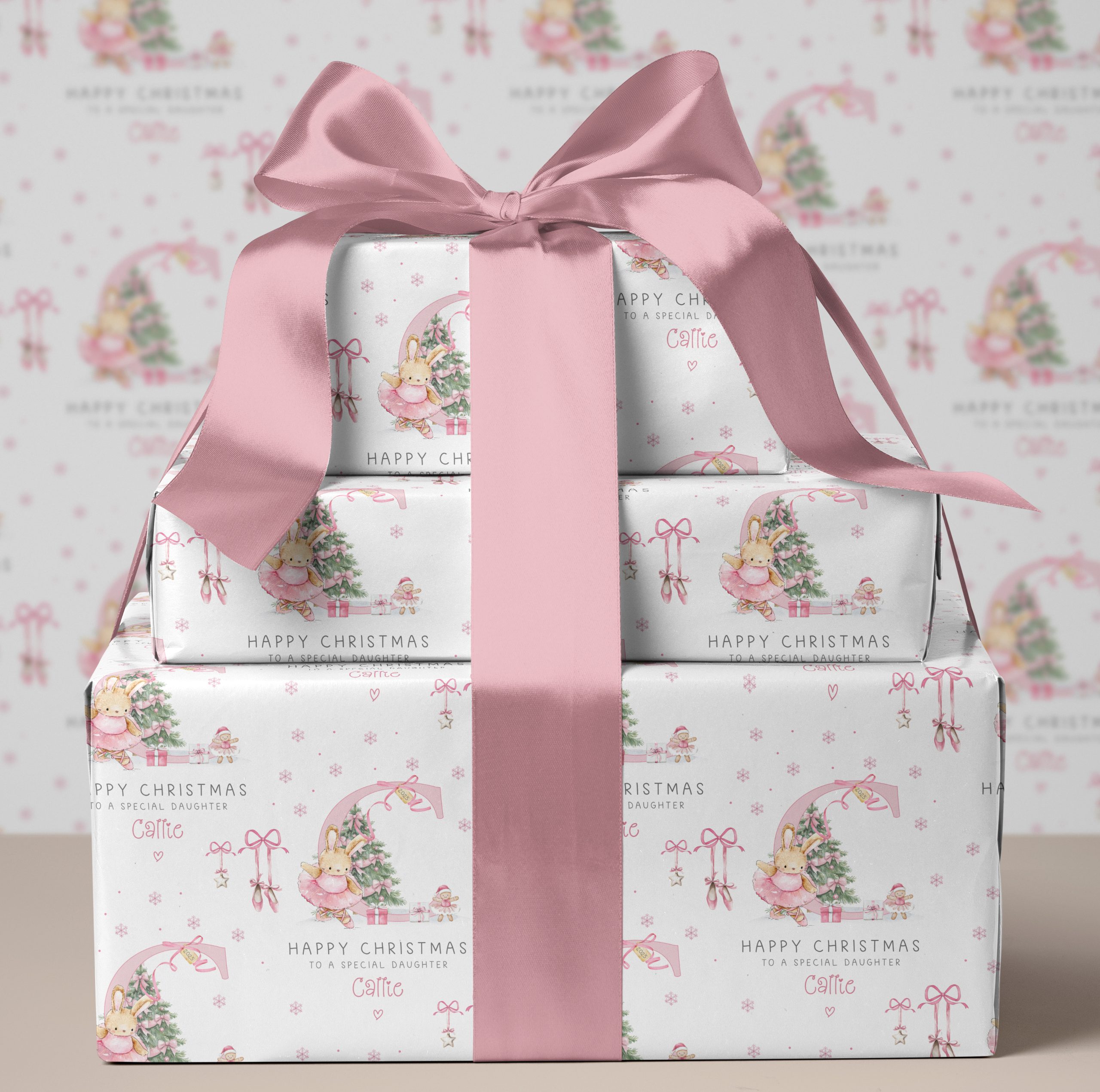 Personalised pink ballet Christmas gift wrapping paper. Personalised with a pink letter inital.