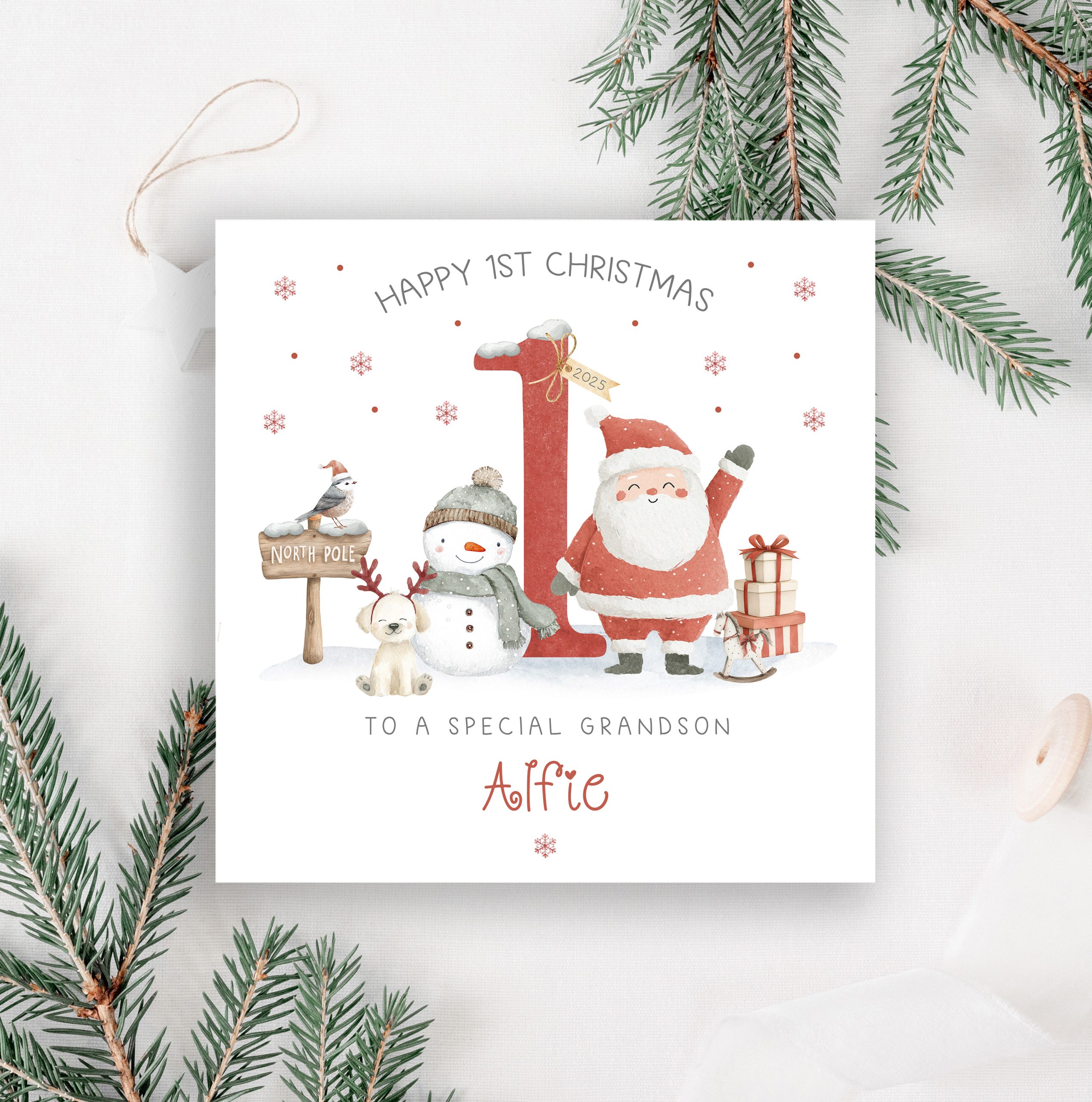 Personalised Baby's 1st Christmas Card, with santa and a snow man in front of a large red number one.