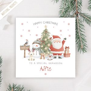 Personalised Christmas Card featuring Santa Claus waving in front of a Christmas tree, with a snowman wearing a bobble hat and scarf at the north pole
