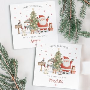 Personalised Christmas Card featuring Santa Claus waving in front of a Christmas tree, with a snowman wearing a bobble hat and scarf at the north pole