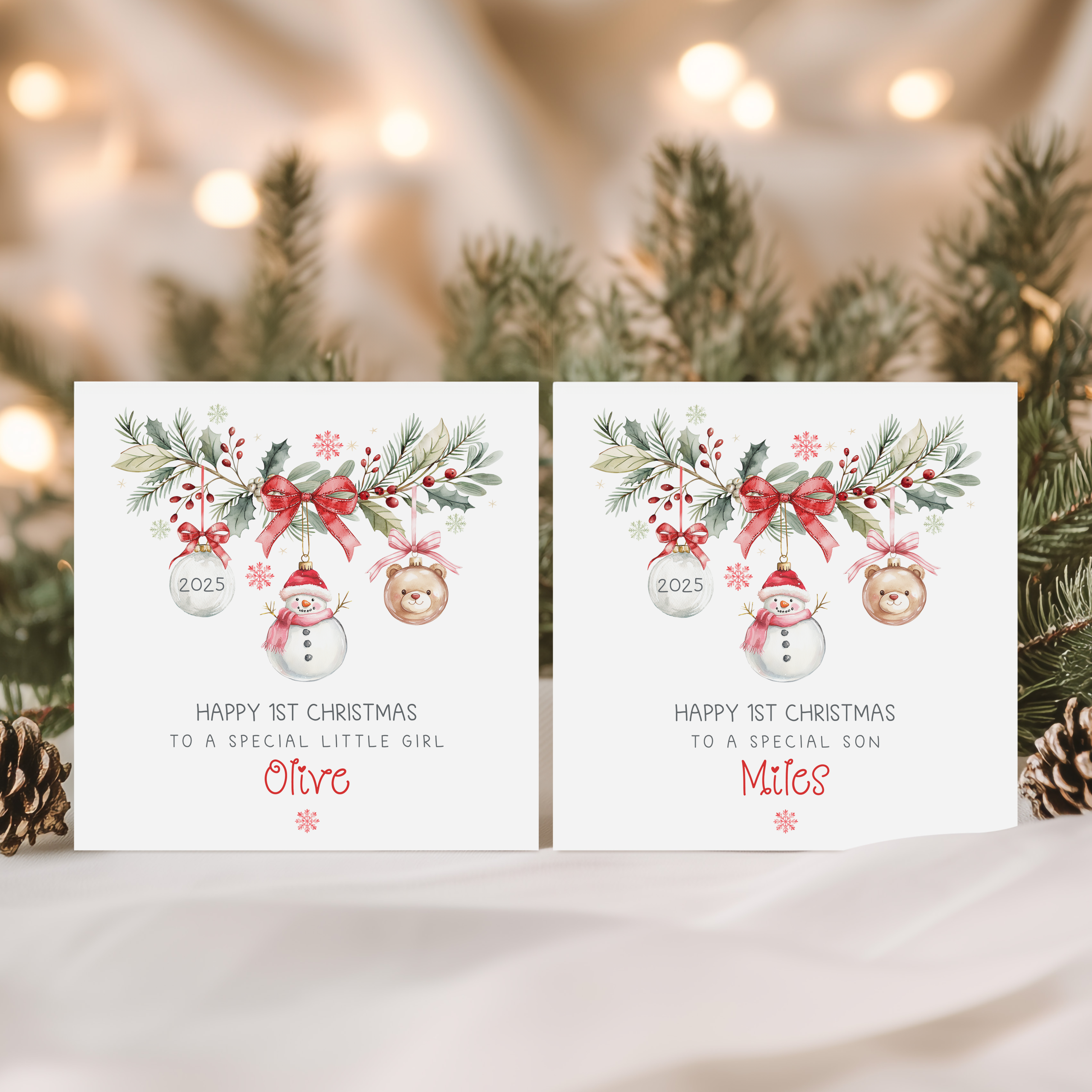 baby's 1st personalised christmas card featuring a festive wreath with a snowman, teddy and clear christmas bauble hanging from it. The baby's name appears underneath.