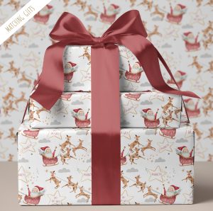 This delightful Personalised Santa Christmas Gift Wrapping Paper adds a festive and unique touch to your holiday gift-giving, featuring charming reindeers soaring through the sky with Santa's sleigh filled with presents, making your gifts even more special and memorable