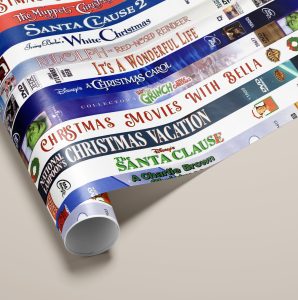 This is a delightful and nostalgic Christmas gift wrapping paper! Printed vintage DVD Classic Christmas Movie Titles. Personalise with the recipitents name or add your own text, with a strict limit of 30 characters - including spaces. Imagine unwrapping presents wrapped in vintage DVD movie titles, each one evoking fond holiday memories or classic films. It’s a perfect blend of fun, retro charm, and holiday spirit.
