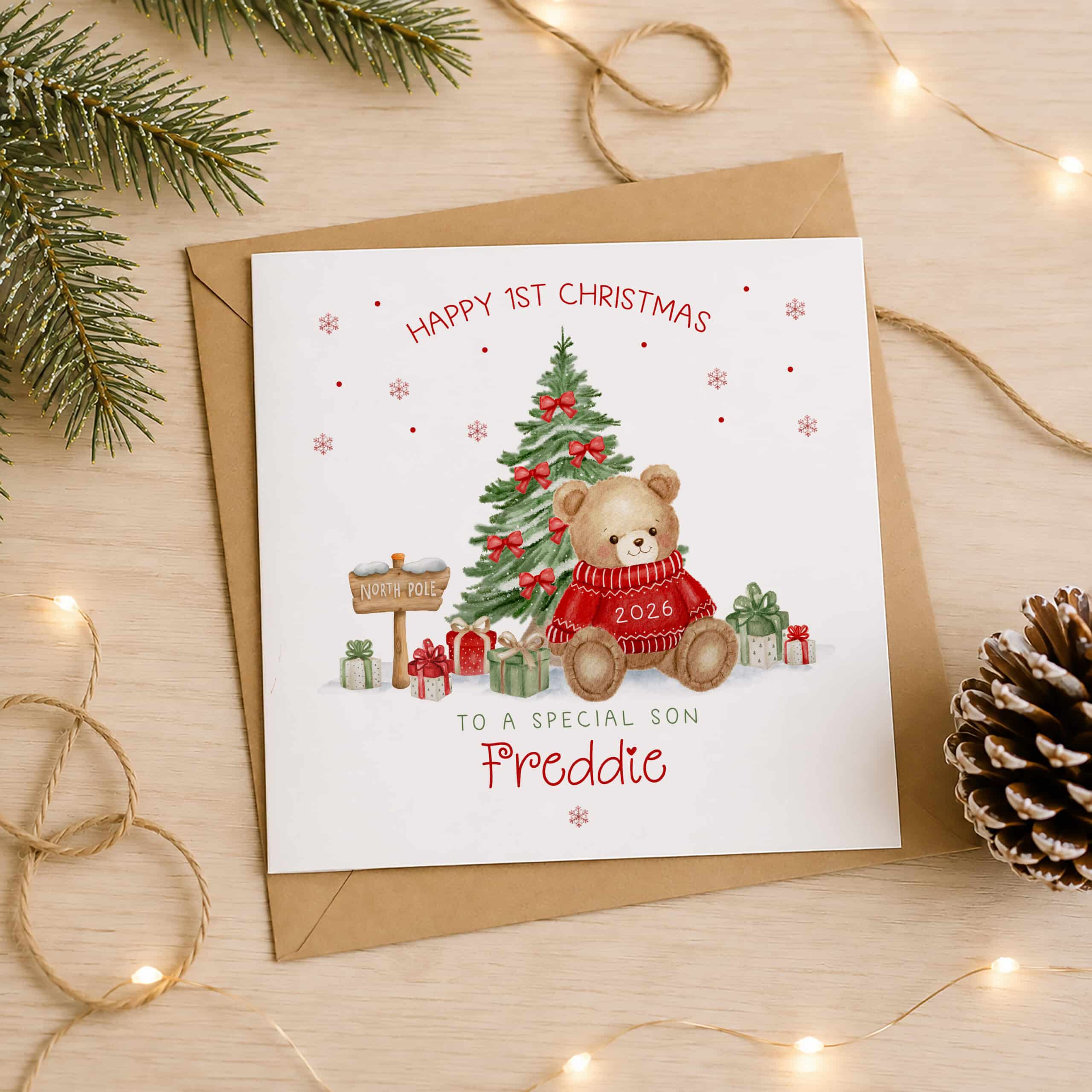 Personalised baby boy first Christmas card with teddy bear and tree