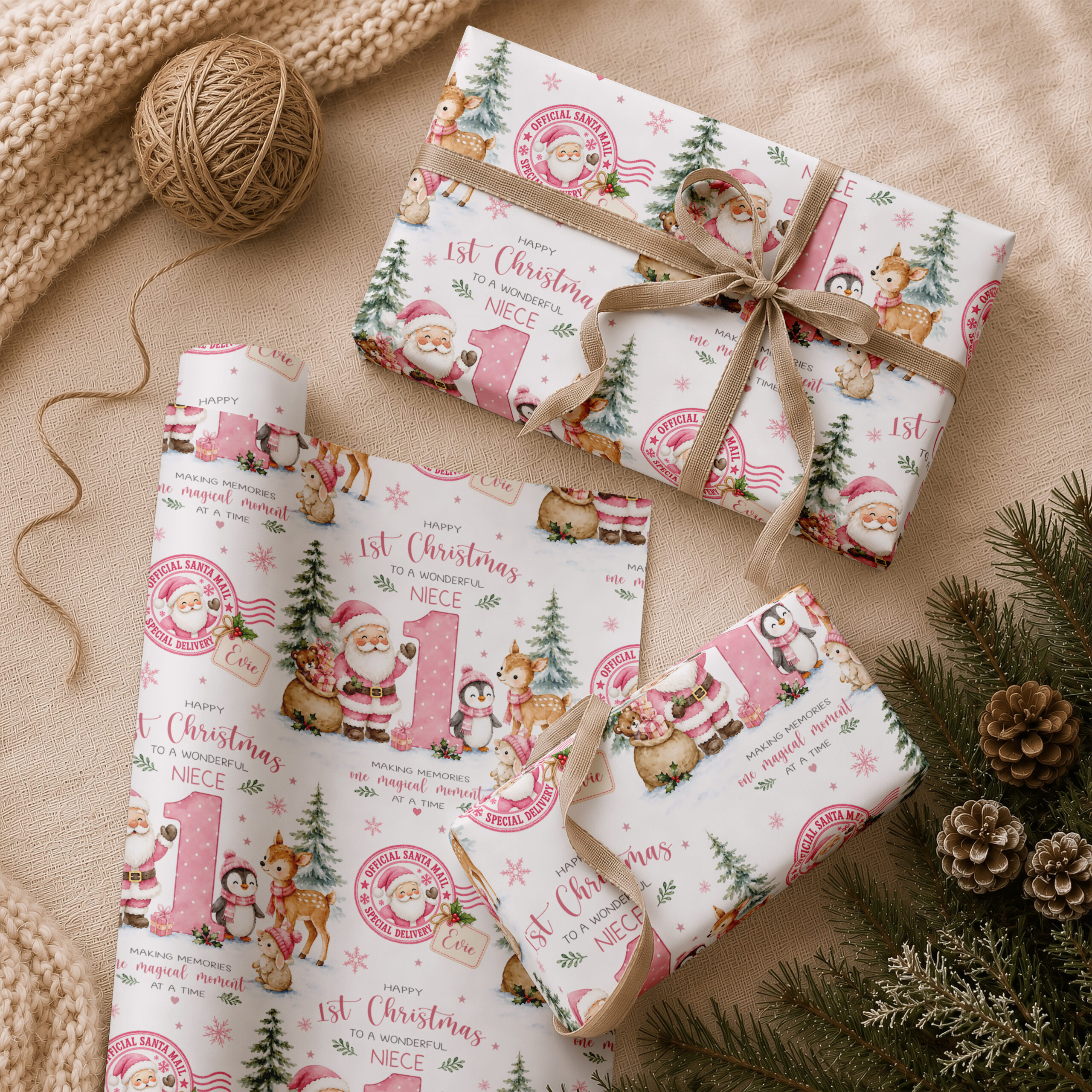 Pink personalised 1st Christmas wrapping paper on a Christmas present