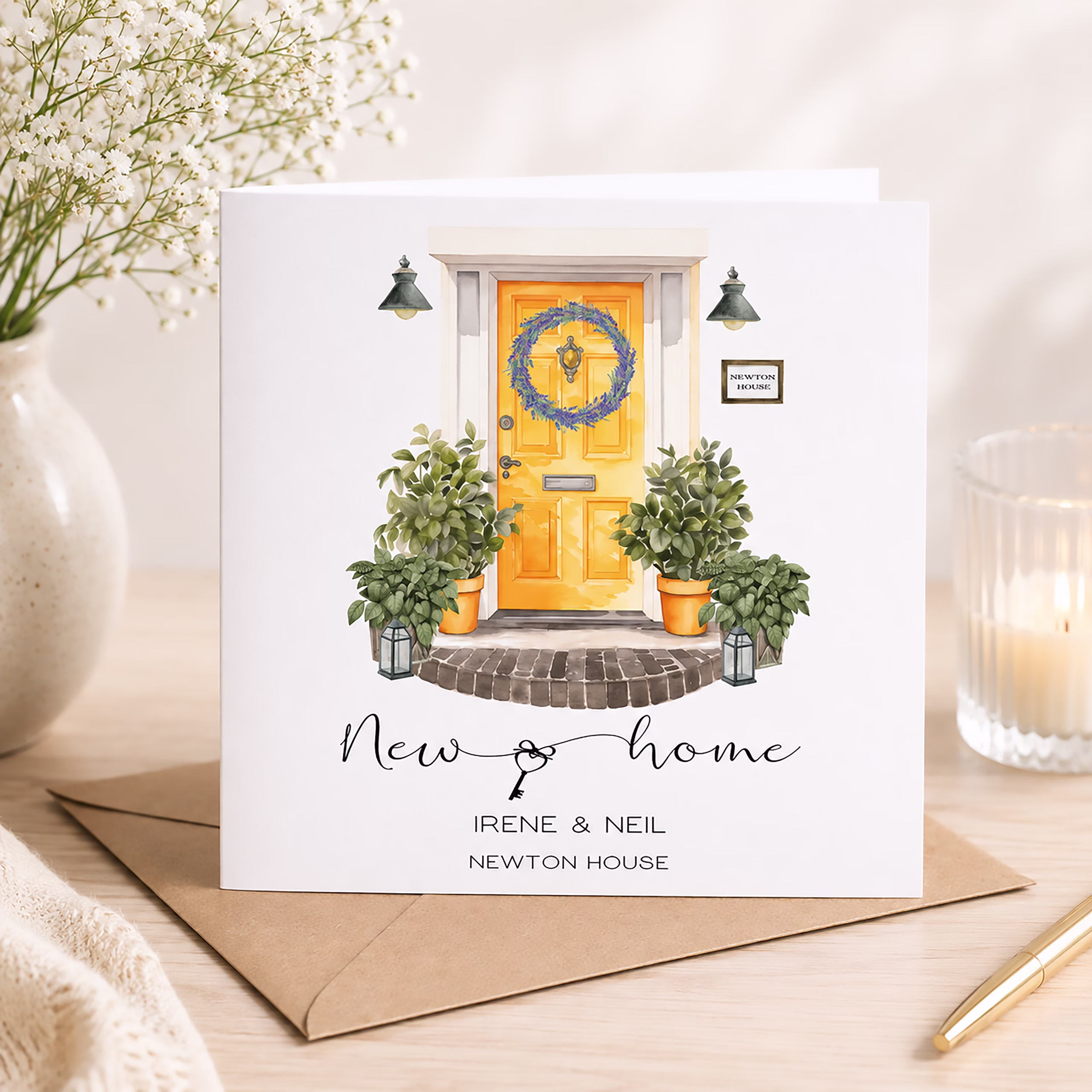 Personalised new home card featuring a yellow front door, plants and the recipients' names and house name.