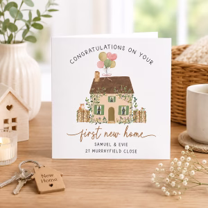 Personalised first new home card featuring a watercolour cottage, balloons and the couple's names and new address.