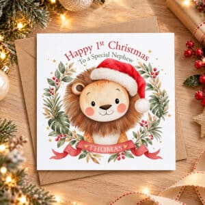 Personalised baby's first Christmas animal card featuring a smiling lion with a Santa hat and festive watercolour decorations.