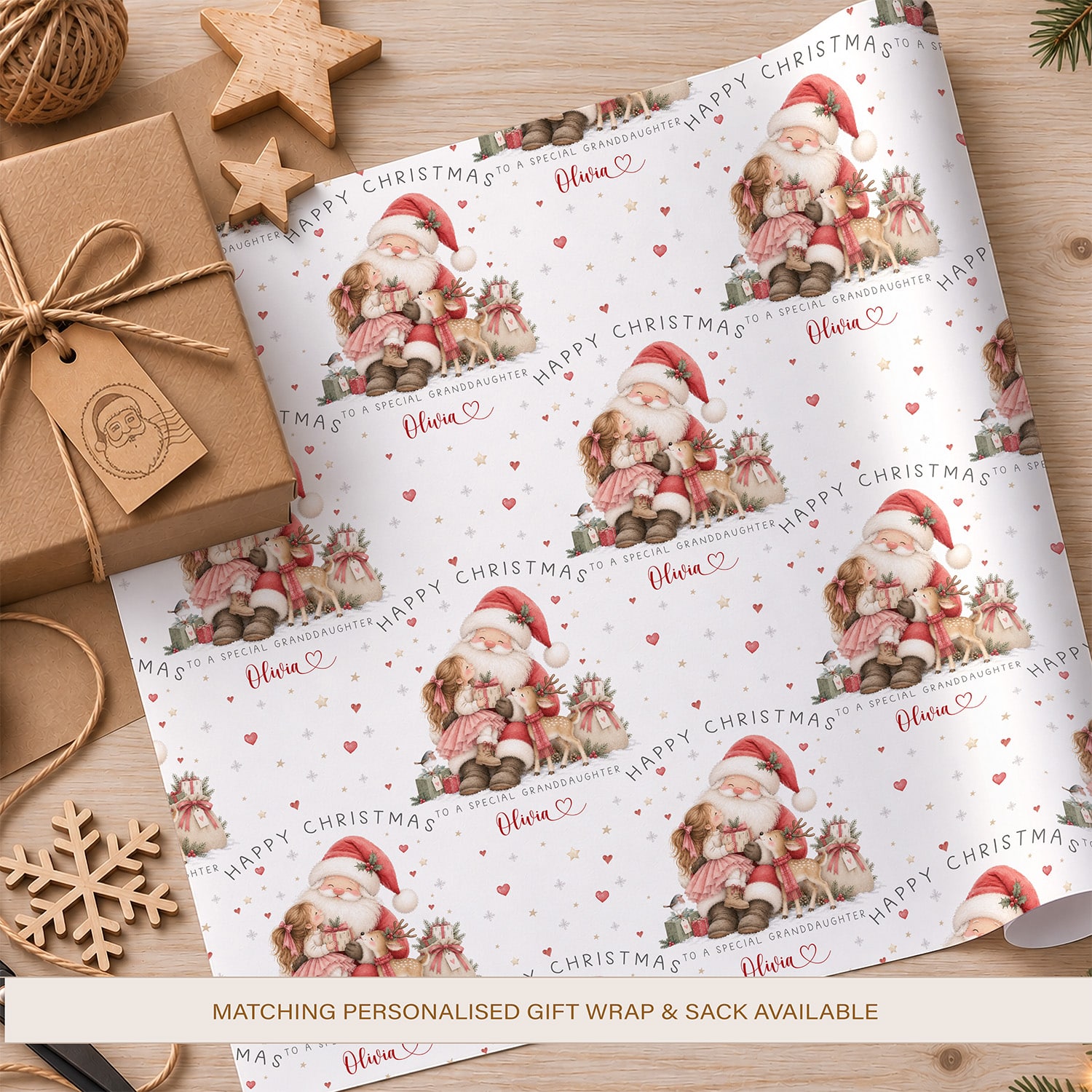 Personalised Santa Christmas wrapping paper featuring a festive watercolour Santa illustration, Christmas gifts and decorative stars